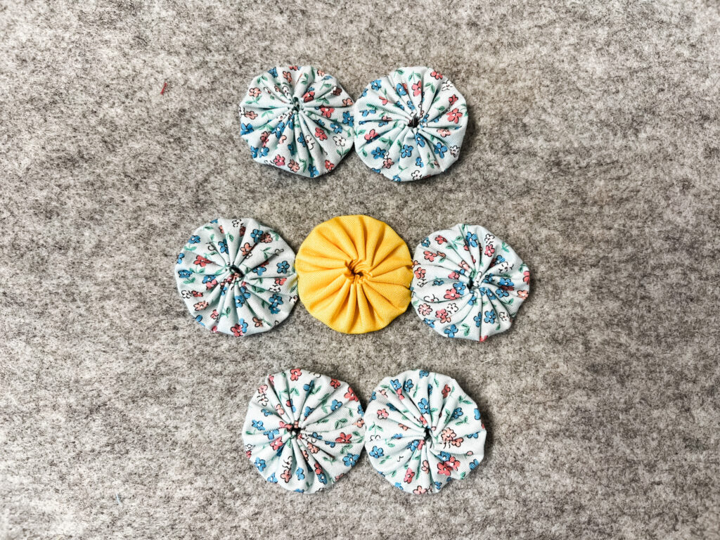 Arranging yo-yos into flower, step 5