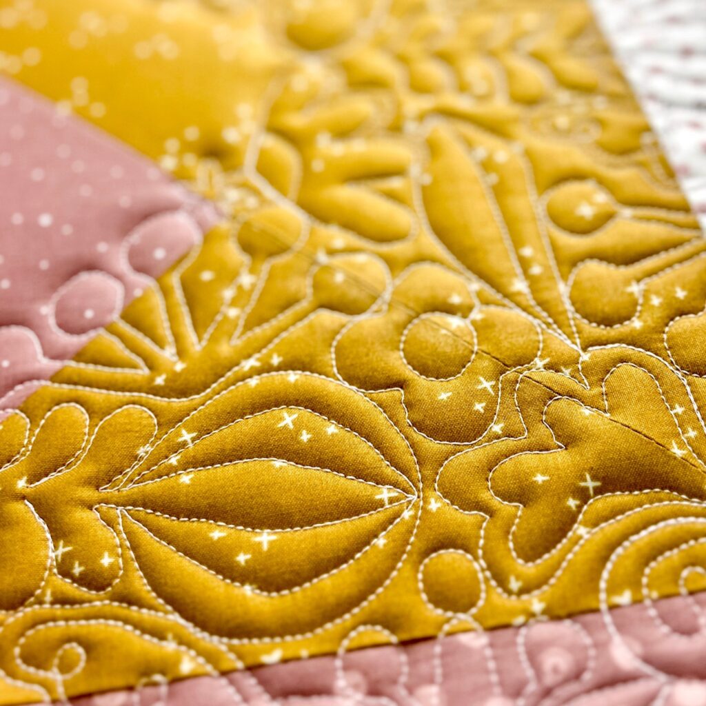 Love Notes Quilt by Tamara Darragh for Remi Vail Studio using the Blush n Butterscotch Collection designed by Simple Simon and Co for Riley Blake Designs