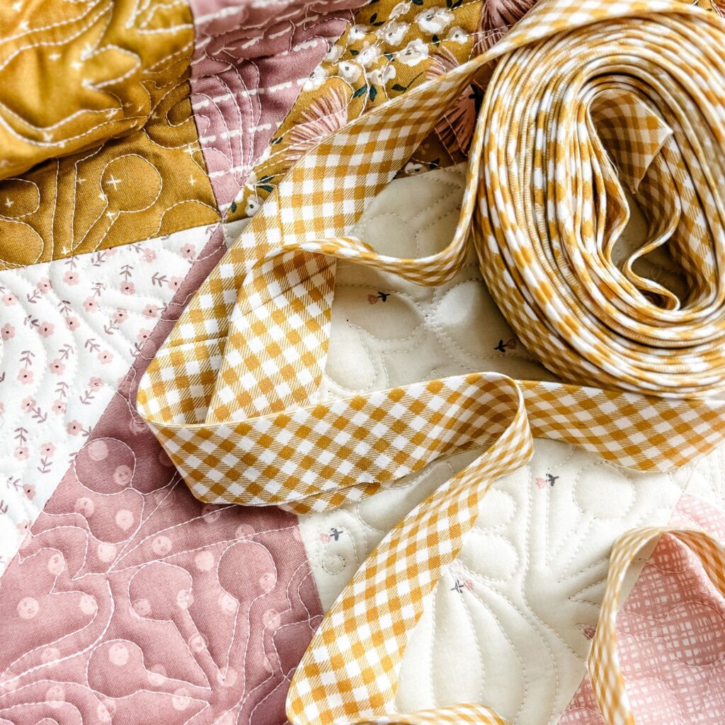 Step by Step Bias Binding Quilt Tutorial Love Notes Quilt by Tamara Darragh for Remi Vail Studio using the Blush n Butterscotch Collection designed by Simple Simon and Co for Riley Blake Designs 