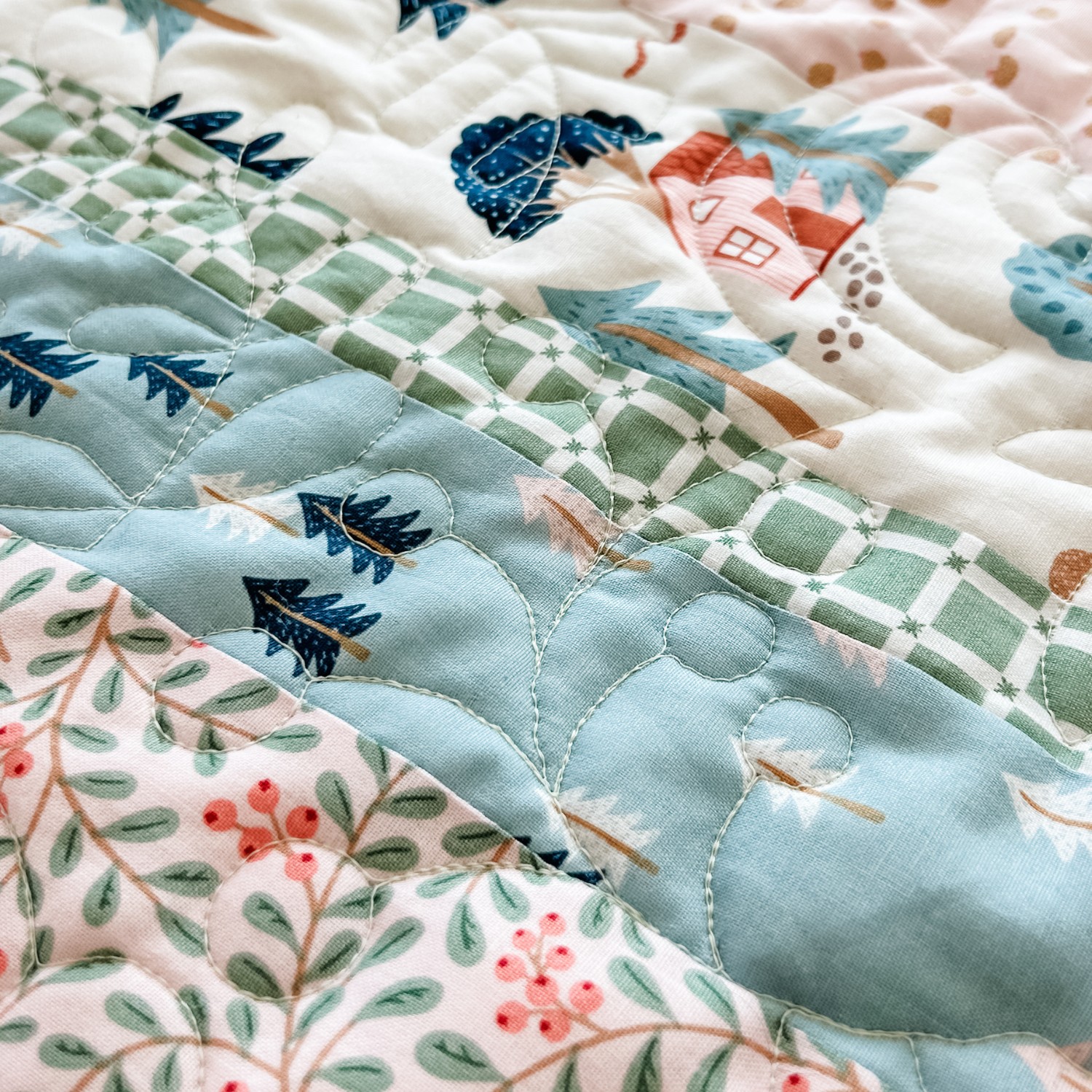 Folk Fables Quilt, throw size, pattern designed by Tamara Darragh for Remi Vail Studio using the Forest Village Fabric Collection designed by Little Forest Atelier for Riley Blake Designs